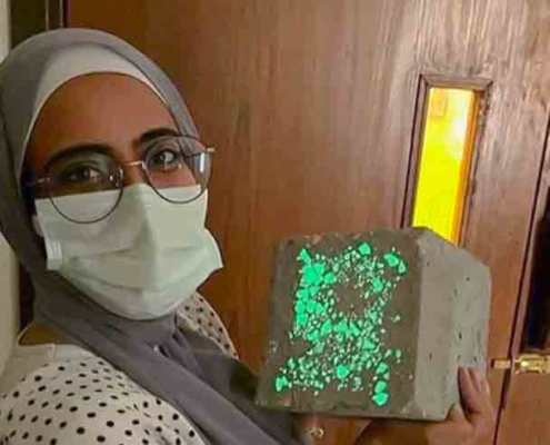 AUC Student Holding Glow-in-the-Dark Concrete